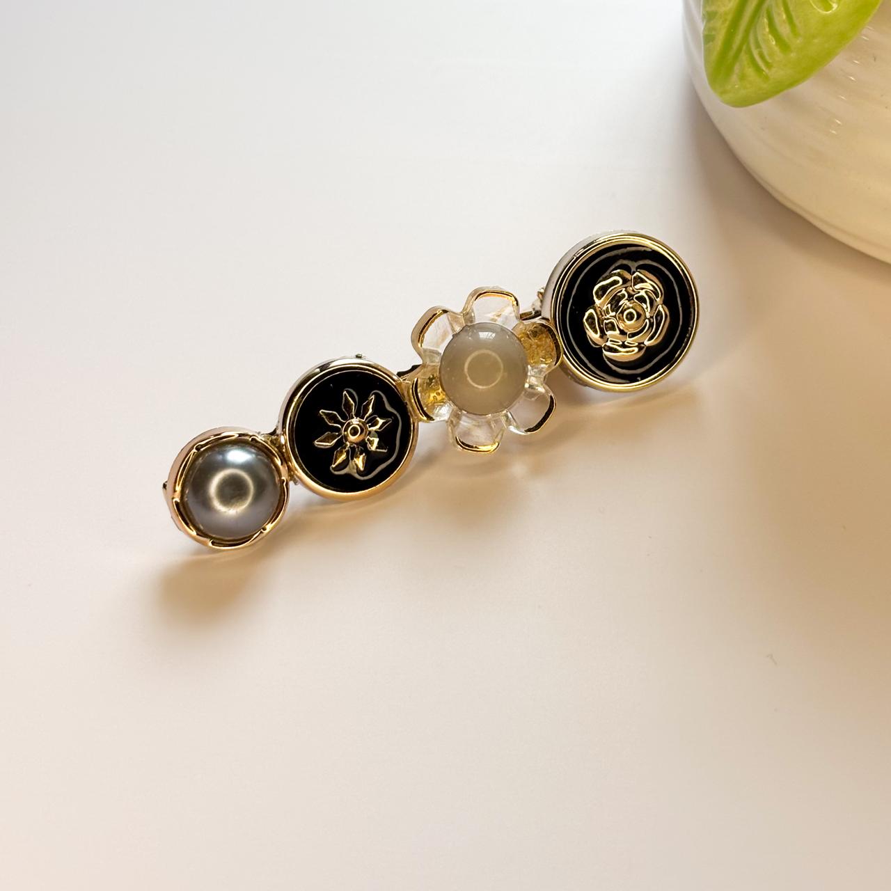 Pearl centered black blossom Hair Slide